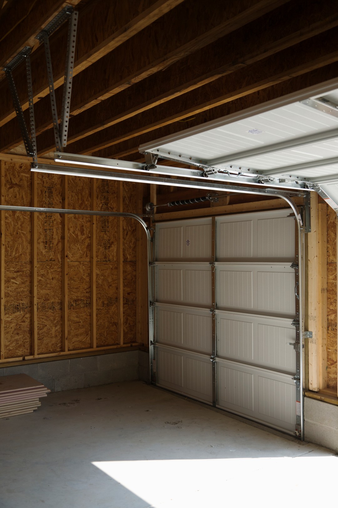 inside of a garage after getting a garage door repair services